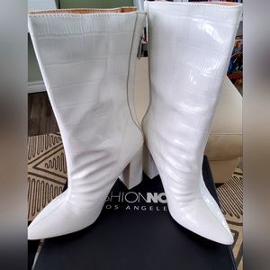 New, still in box Fashion Nova in disguise bootie women's size 7